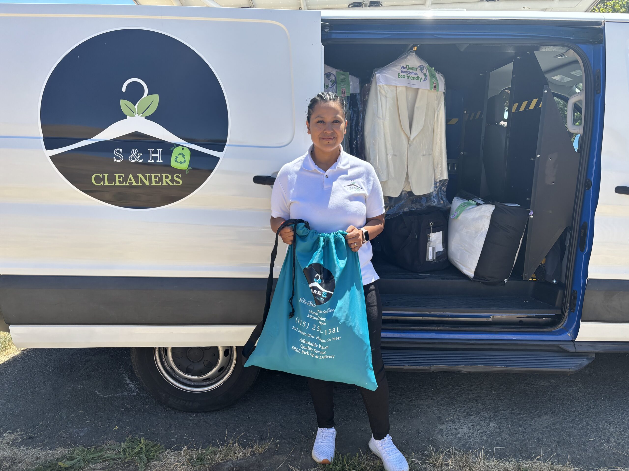 S&H Cleaners picking up laundry from the door